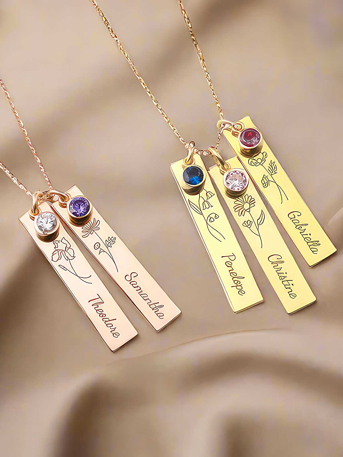 three different necklaces with names on them