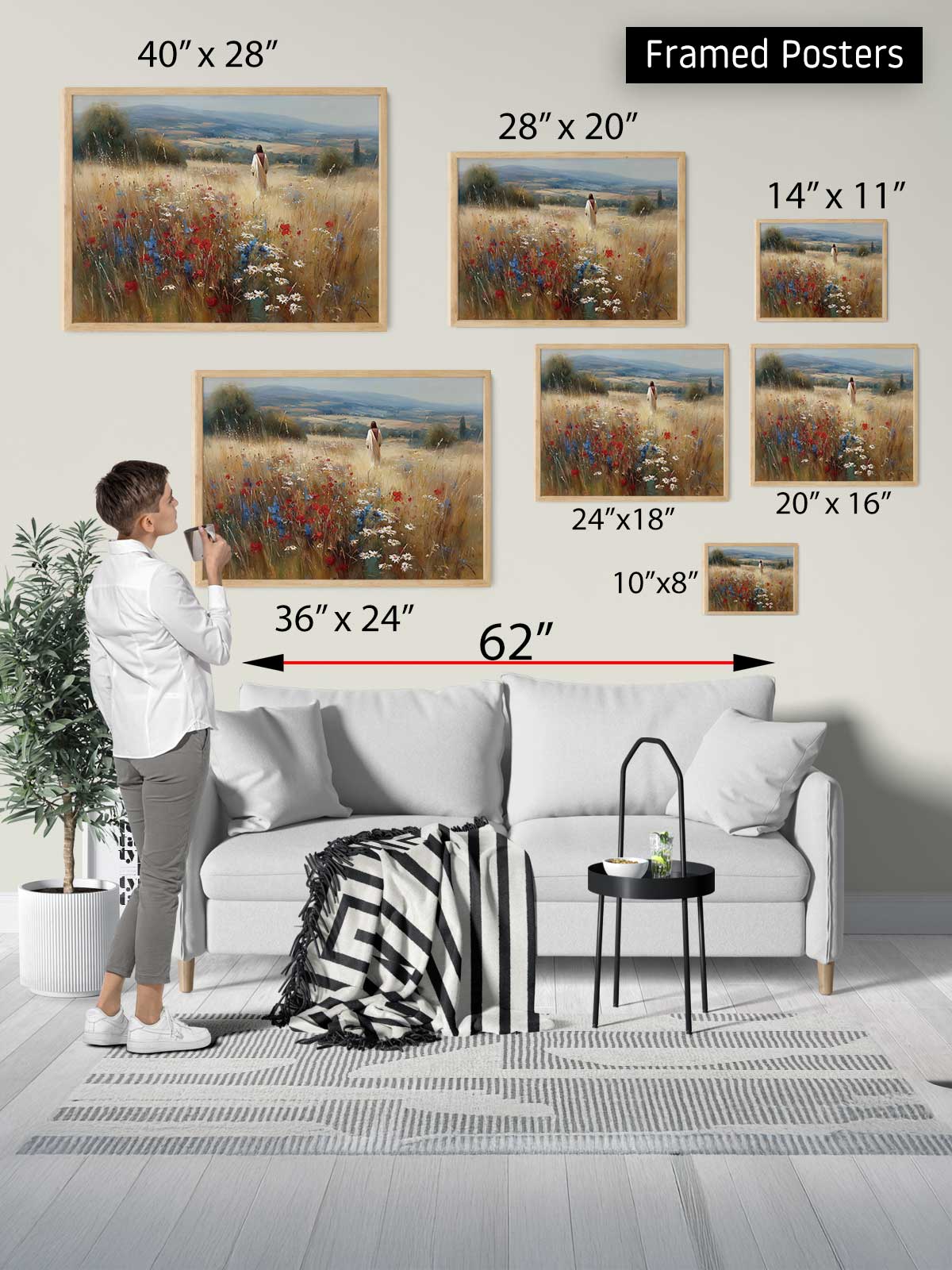 The image is a collage of framed posters of various sizes, including a large landscape painting and smaller paintings of flowers and nature scenes. A person is standing in front of the collage, examining the different sizes of the framed posters.