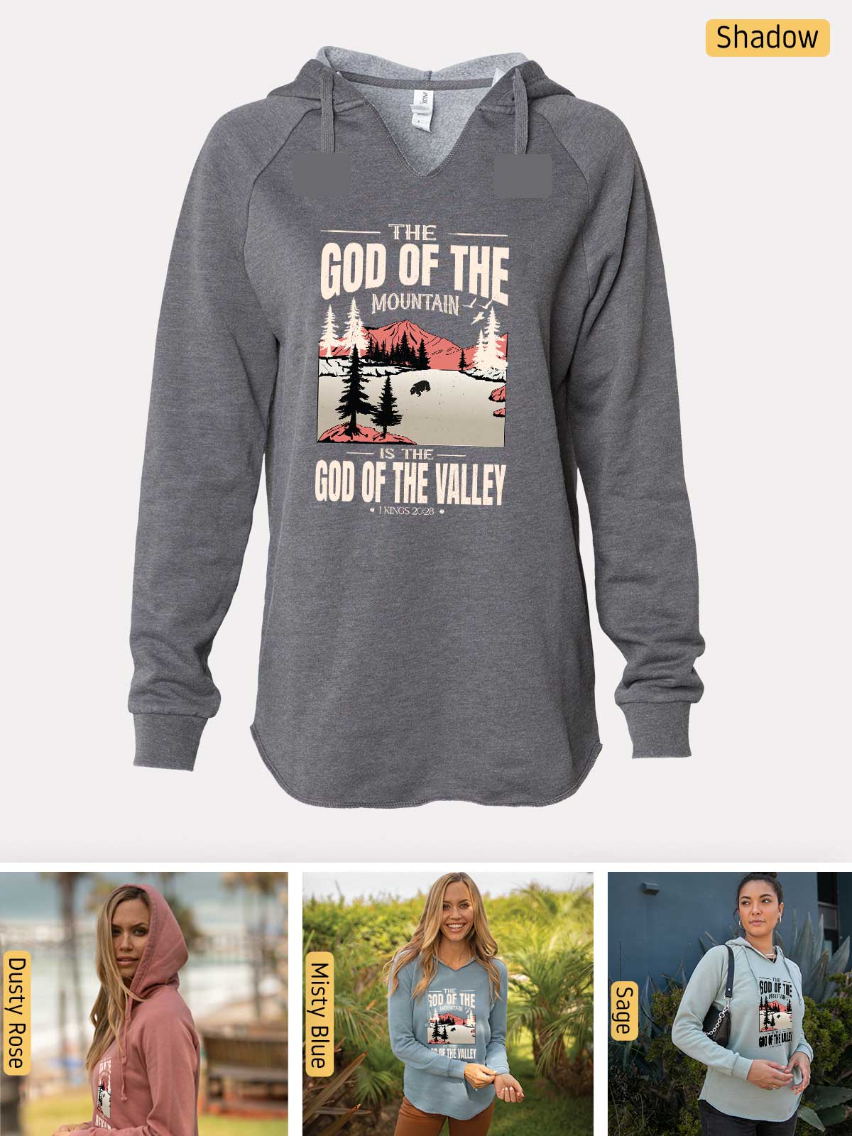 a woman wearing a sweatshirt with the words god of the mountains on it