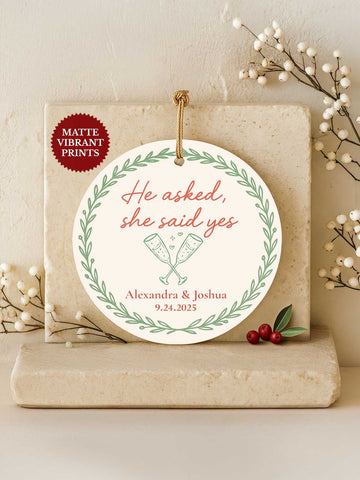 Engagement Ornament – Clinking Glasses Laurel (Circle)