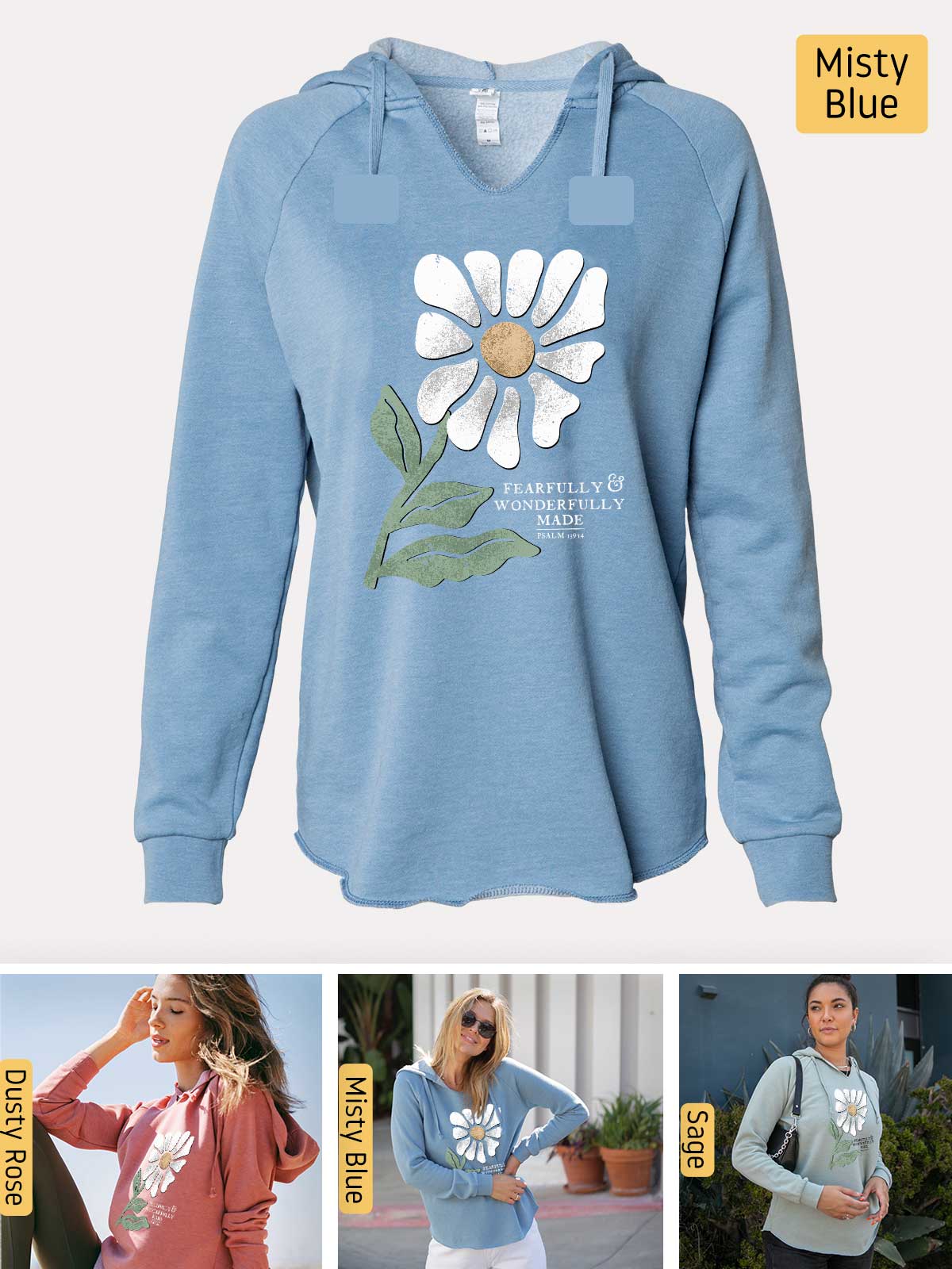 a woman wearing a blue sweatshirt with a flower on it