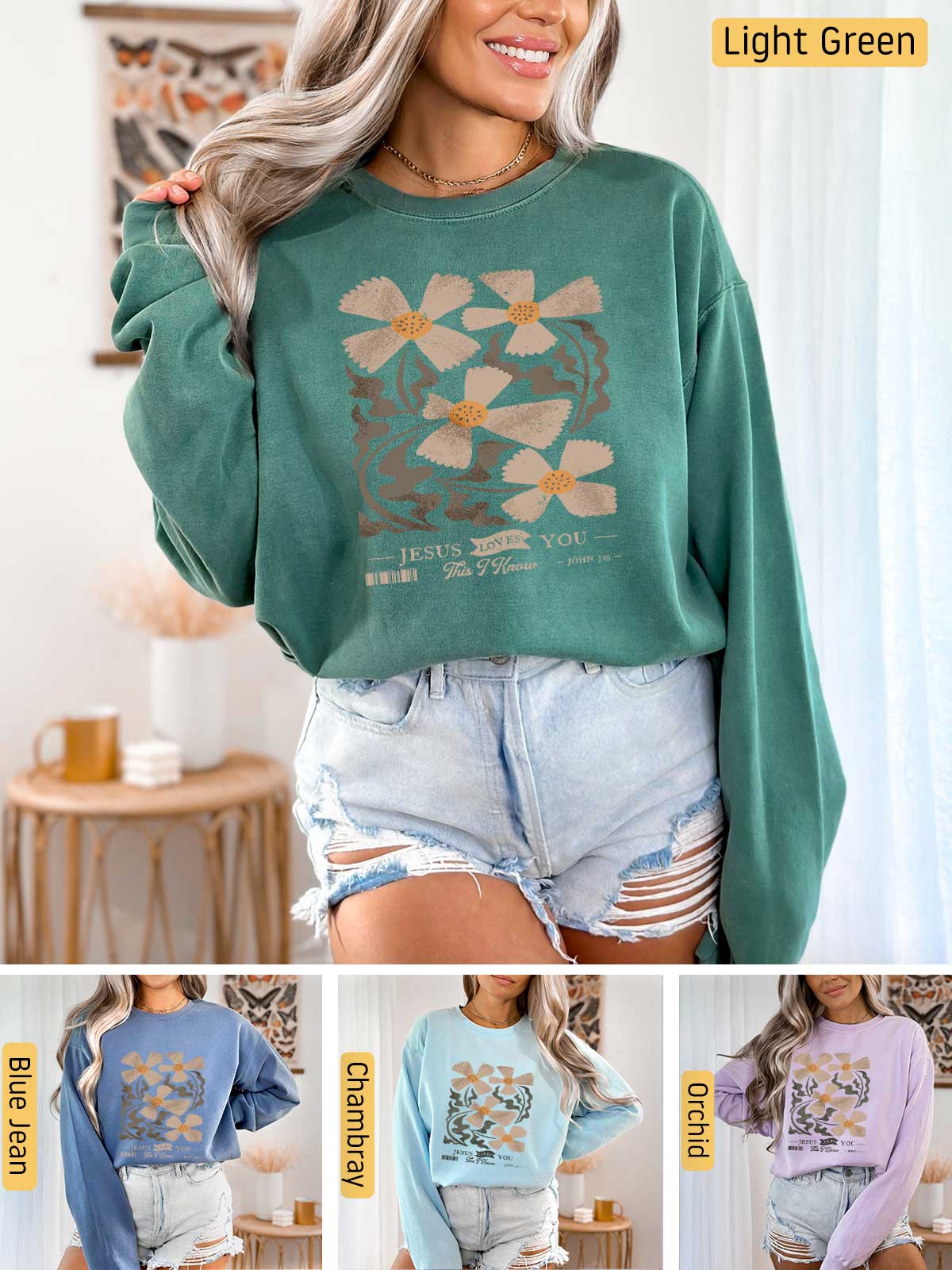 a woman wearing a green sweatshirt with flowers on it