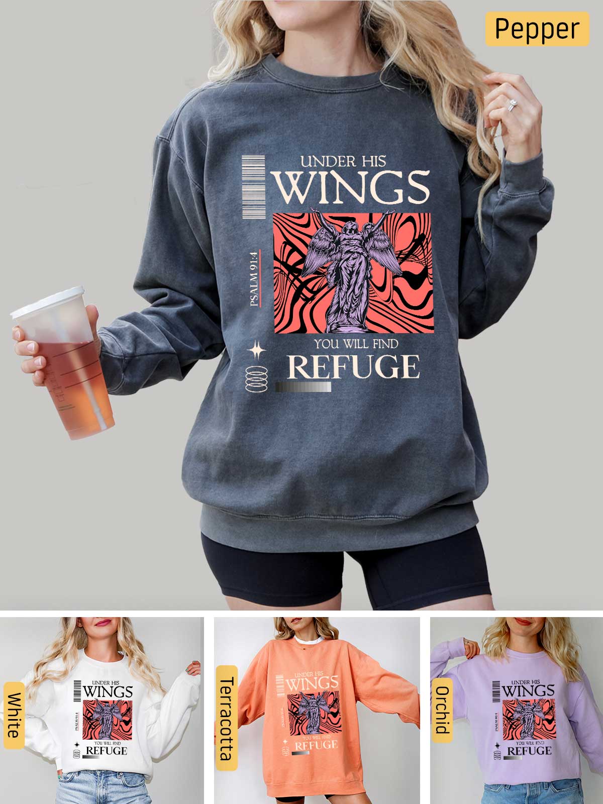 a woman wearing a sweatshirt with wings on it