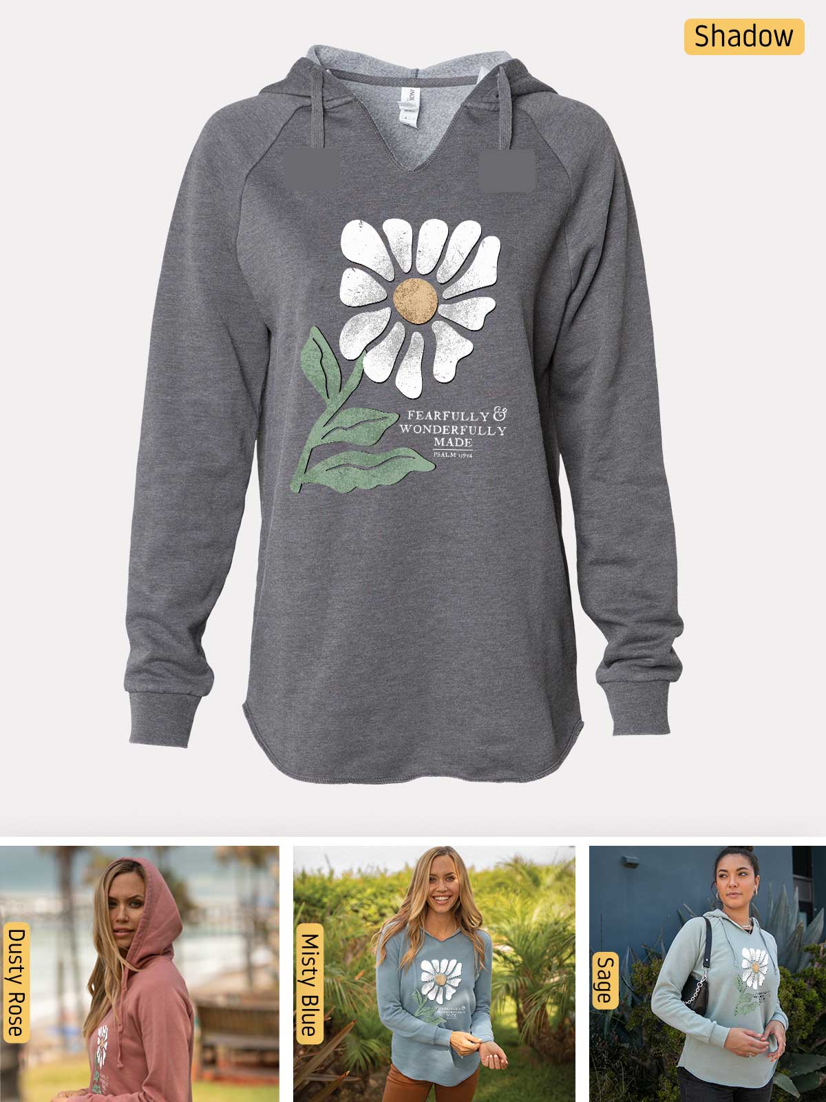 a woman wearing a sweatshirt with a flower on it