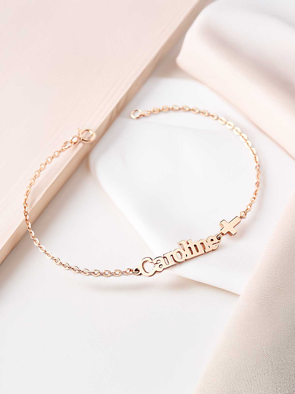 a gold bracelet with a name on it