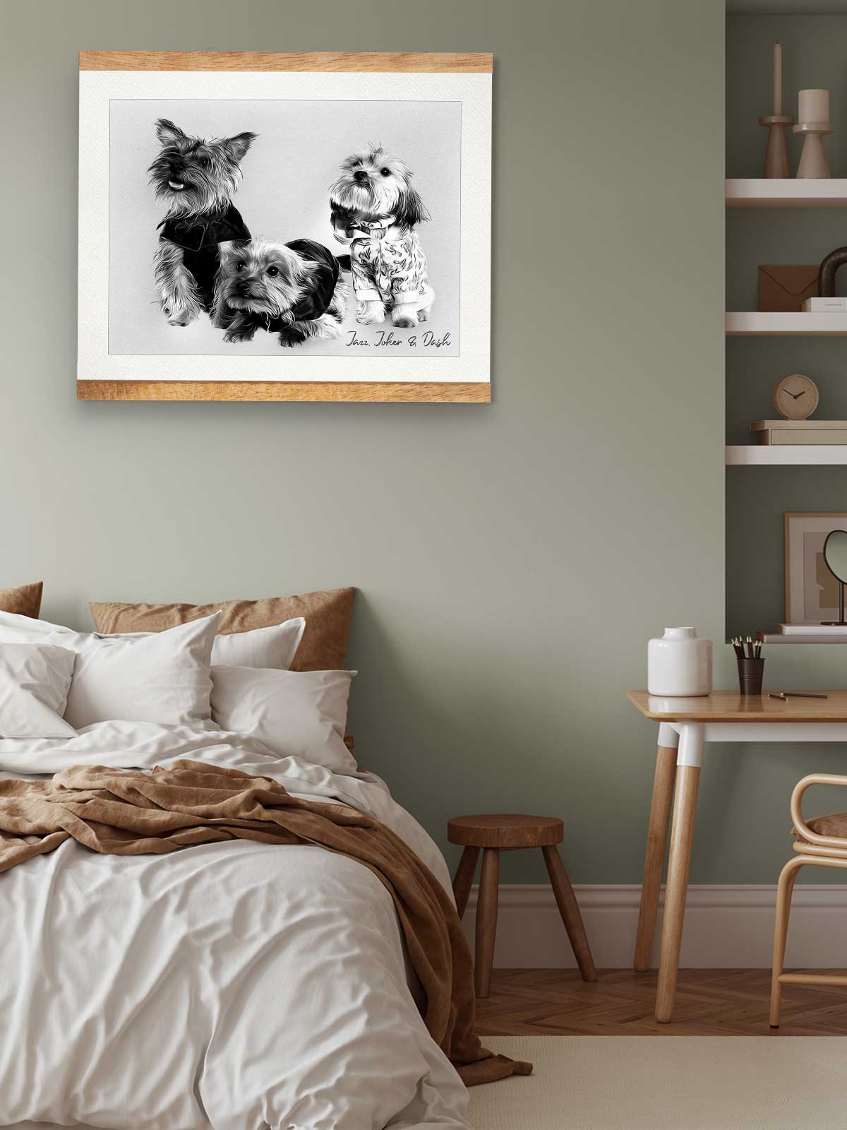a cozy bedroom scene with a framed black and white photograph of three dogs on the wall above a bed with white bedding.