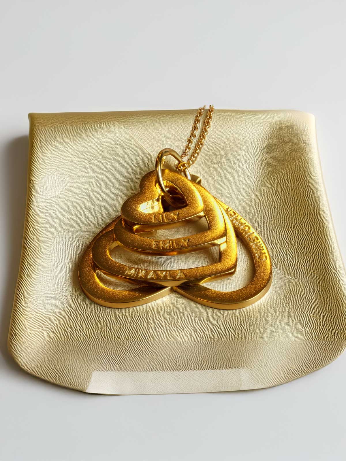 a gold plate with a gold pendant on it