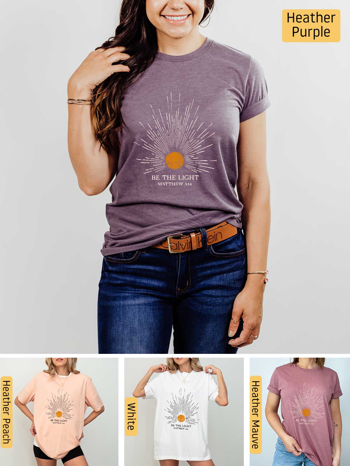 a woman wearing a t - shirt with a sun design on it