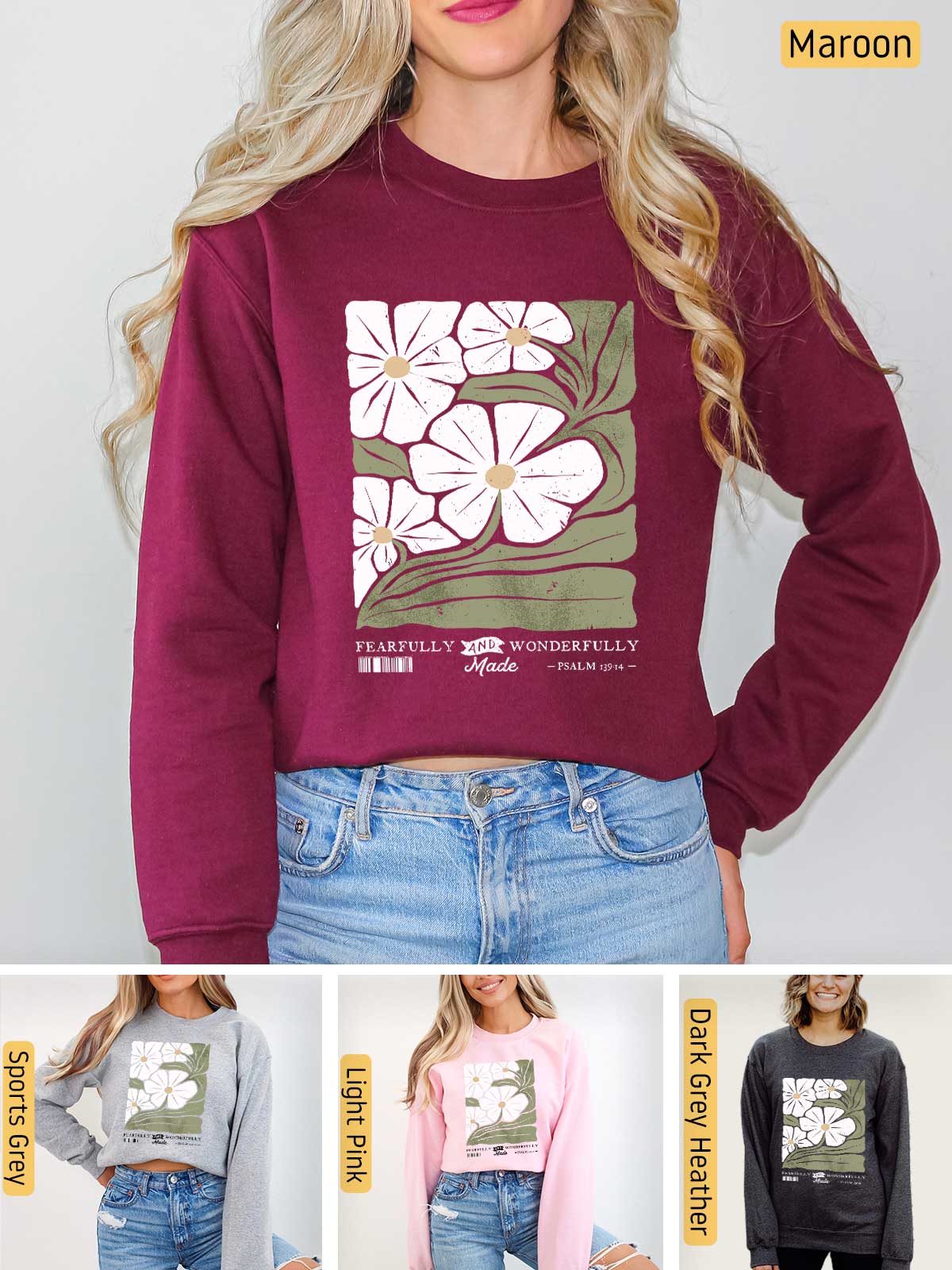 a woman wearing a sweatshirt with flowers on it