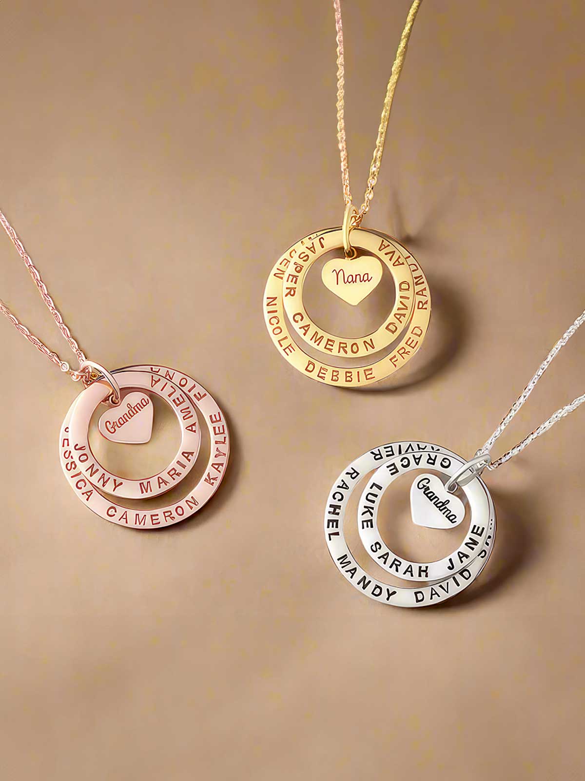 three different necklaces with names on them