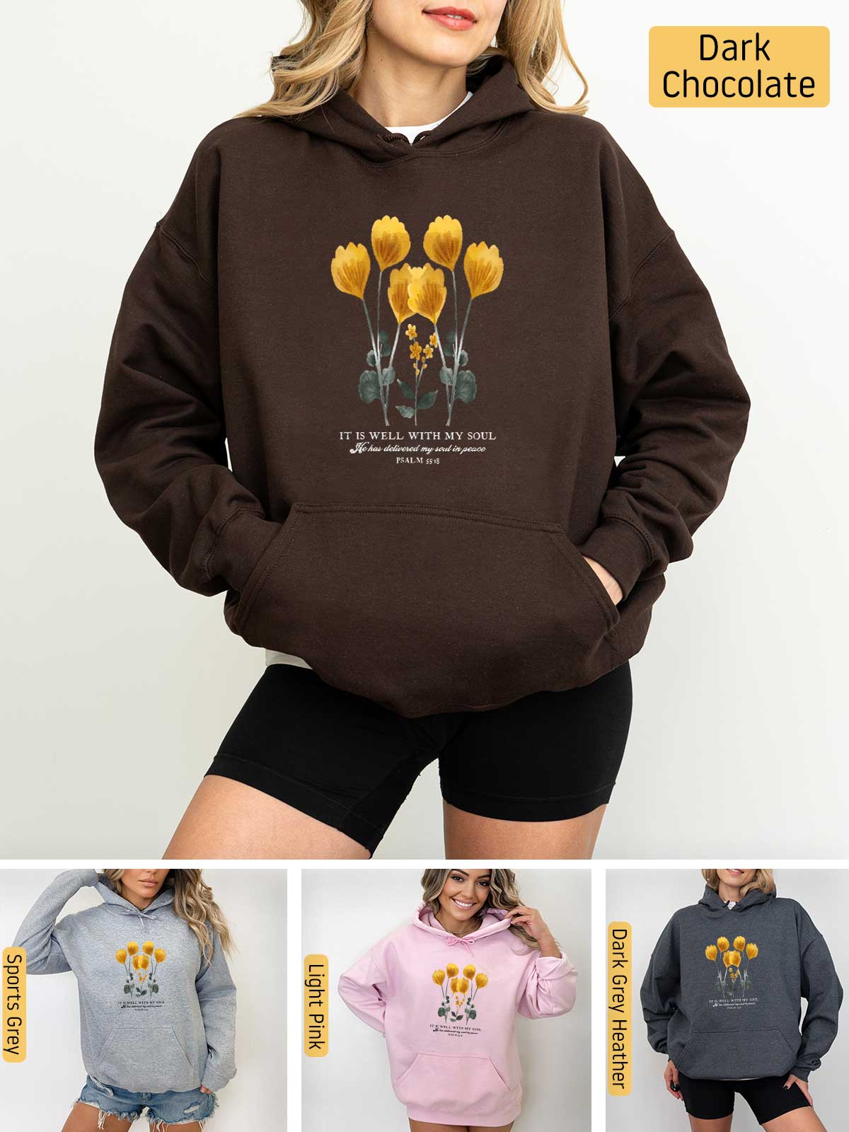 a woman wearing a brown hoodie with yellow flowers on it