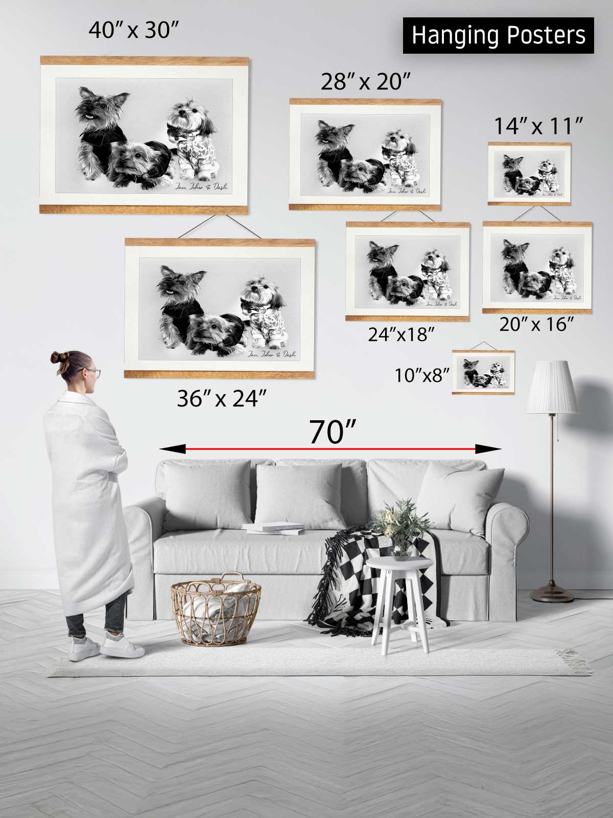 a person standing in a living room, surrounded by various framed photographs of dogs. The photographs are of different sizes and are displayed on the wall, with a couch and a table in the background. The person appears to be observing the photographs, which are arranged in a way that allows for easy comparison and understanding of the sizes and dimensions of the images.