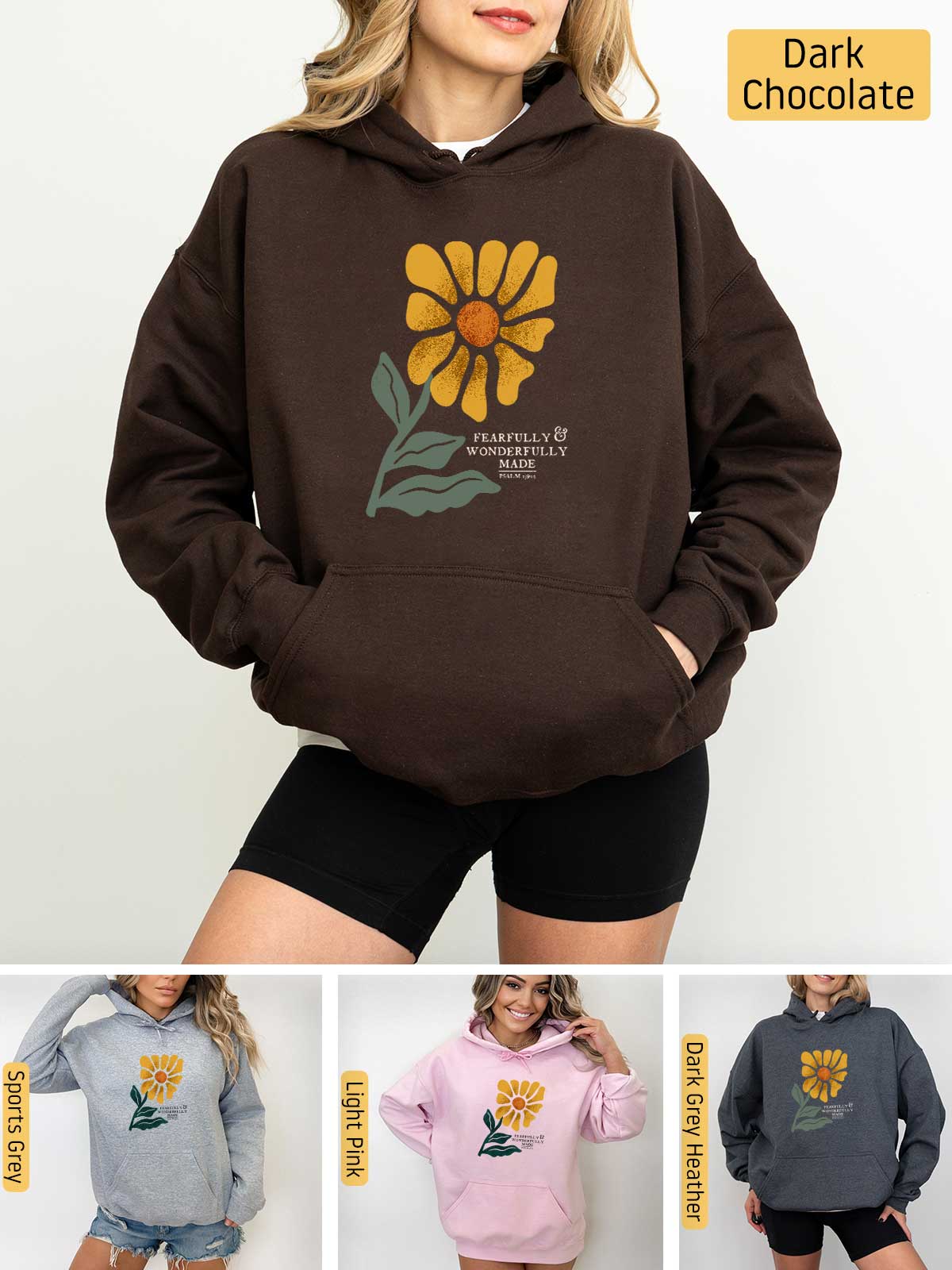 a woman wearing a hoodie with a flower on it