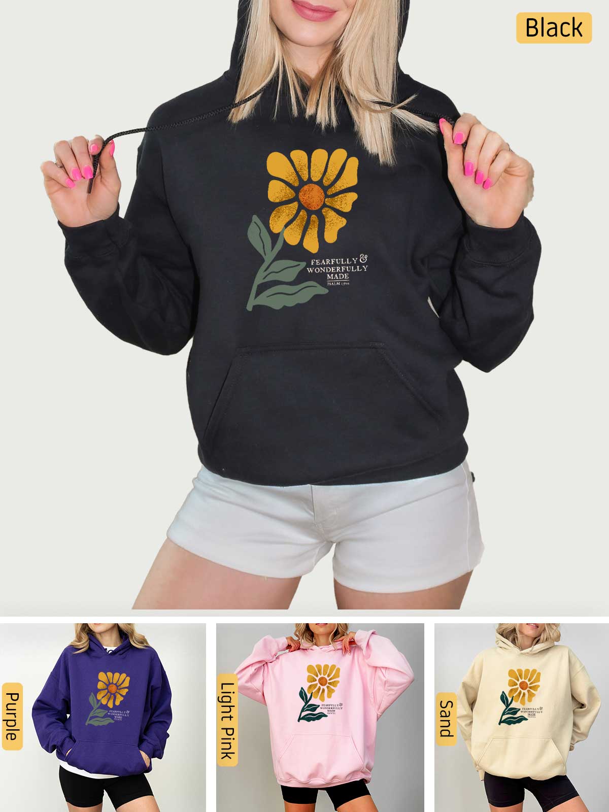 a woman wearing a hoodie with a flower on it