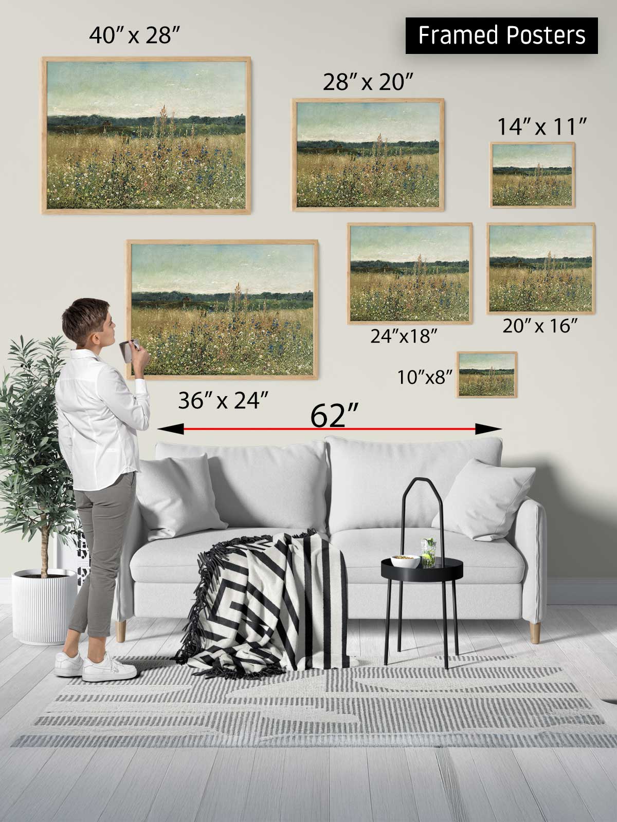 The image is a collage of framed posters of various sizes, including a large landscape painting and smaller framed artworks, displayed on a wall in a living room setting.