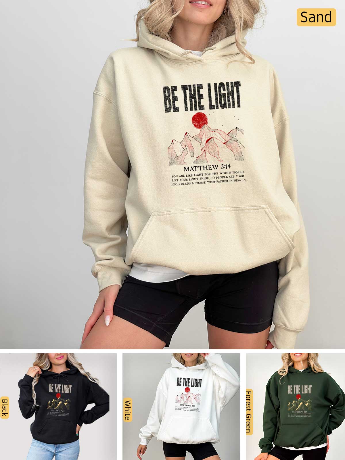 a woman wearing a hoodie with the words be the light on it