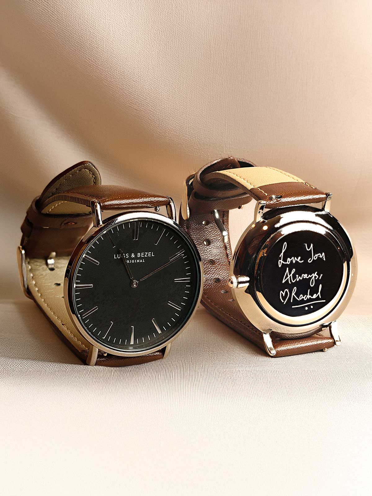 a couple of watches sitting next to each other