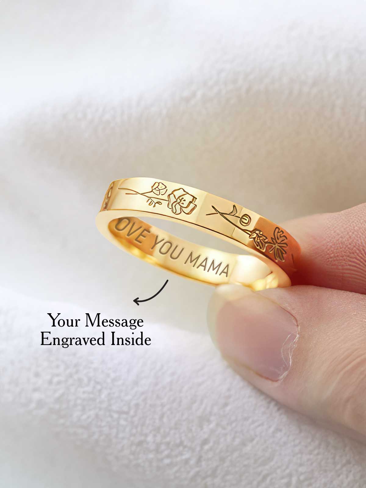 a gold ring with the words love you mama engraved on it