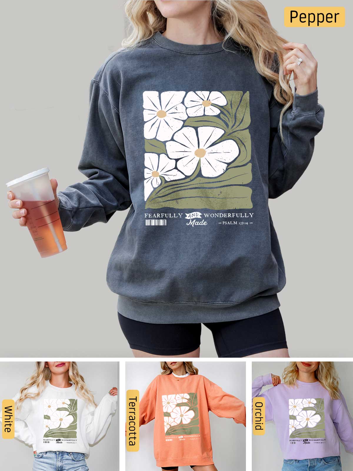 a woman wearing a sweatshirt with flowers on it