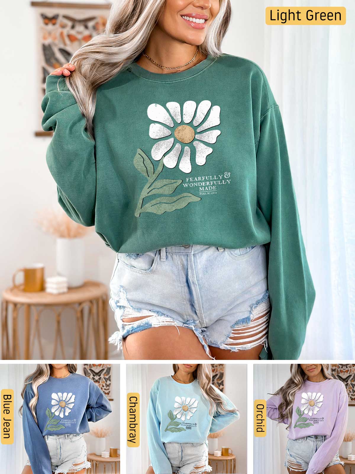 a woman wearing a green sweatshirt with a flower on it