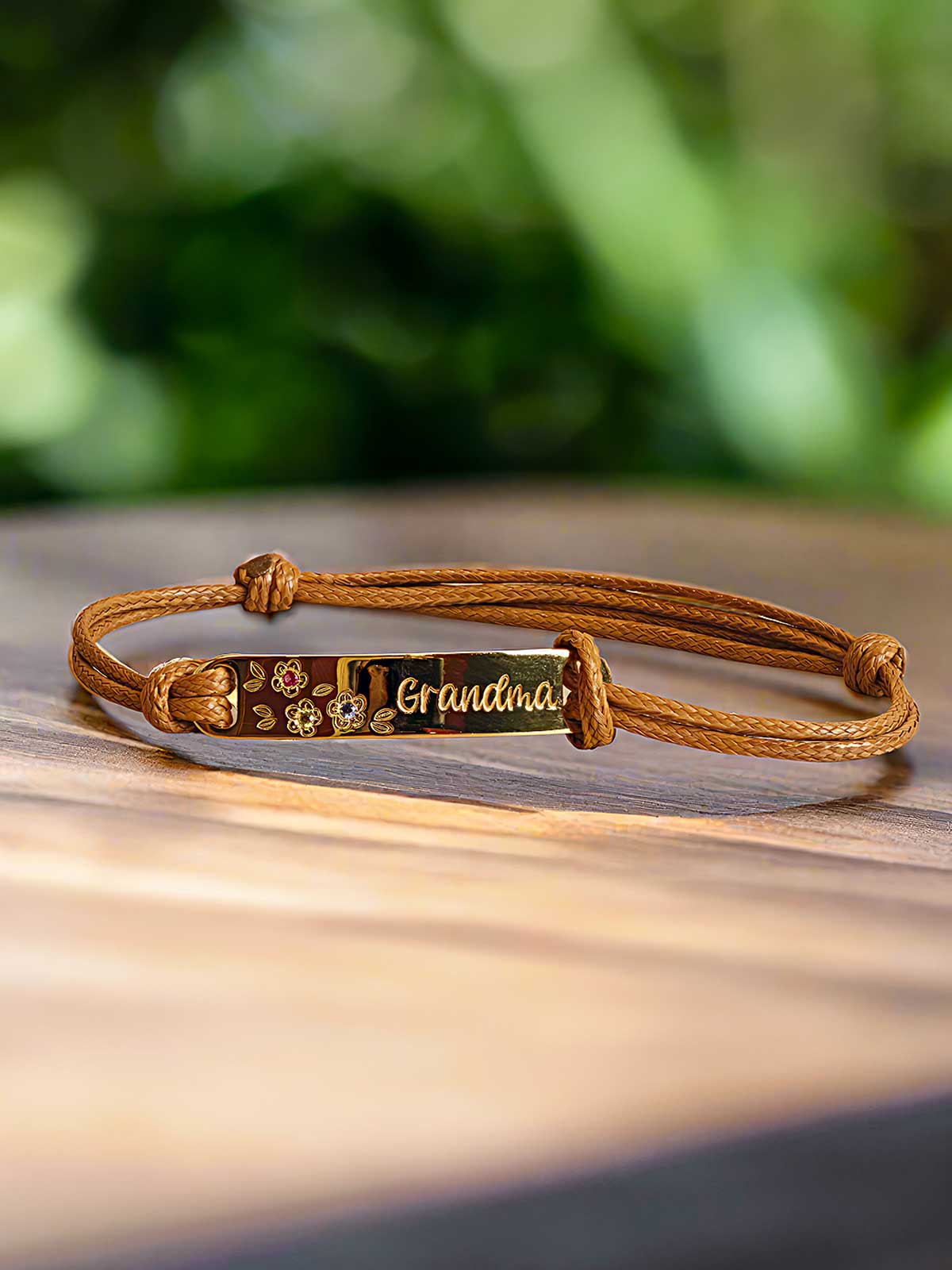 a leather bracelet with a name tag on it