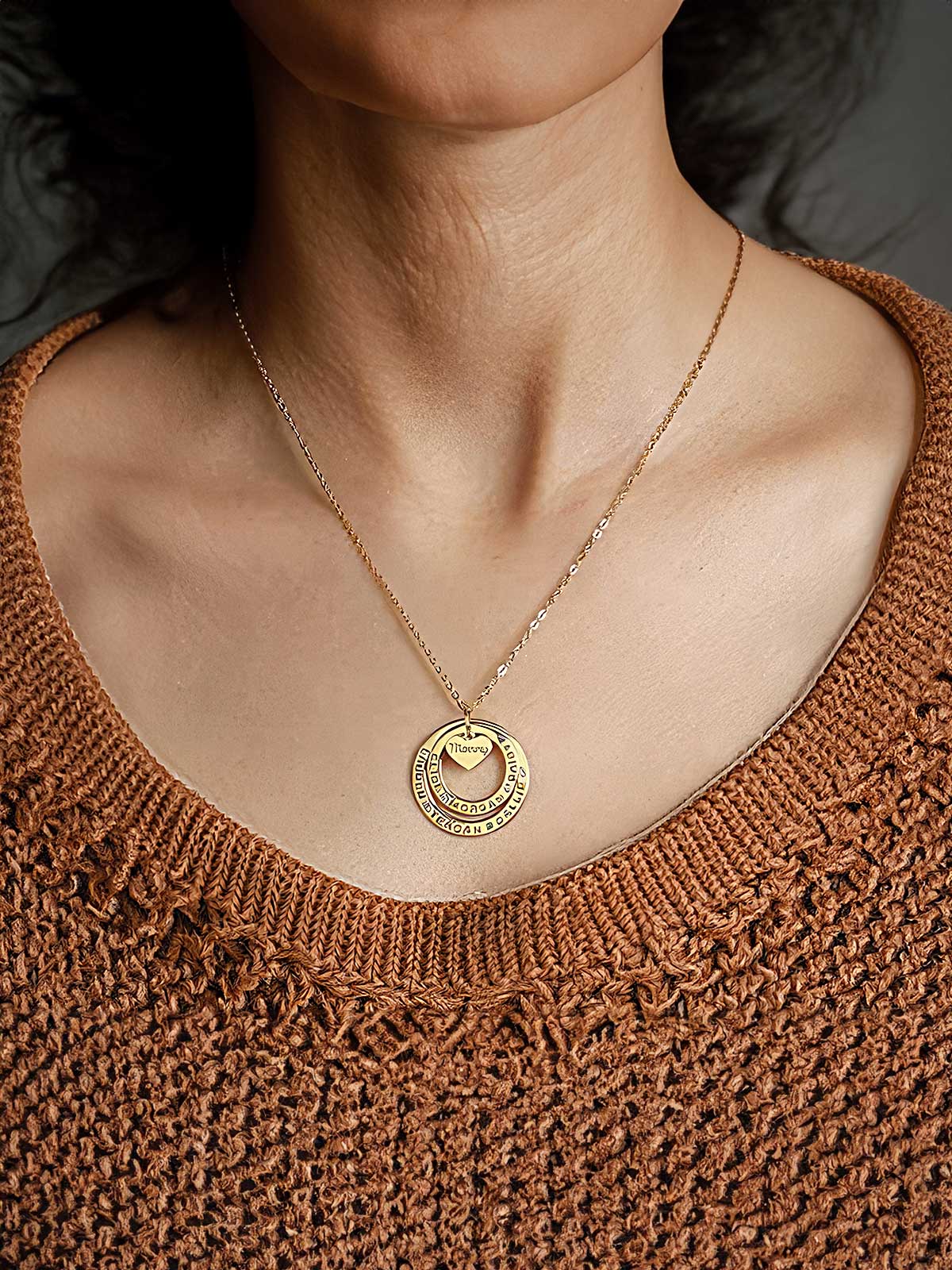 a close up of a woman wearing a necklace