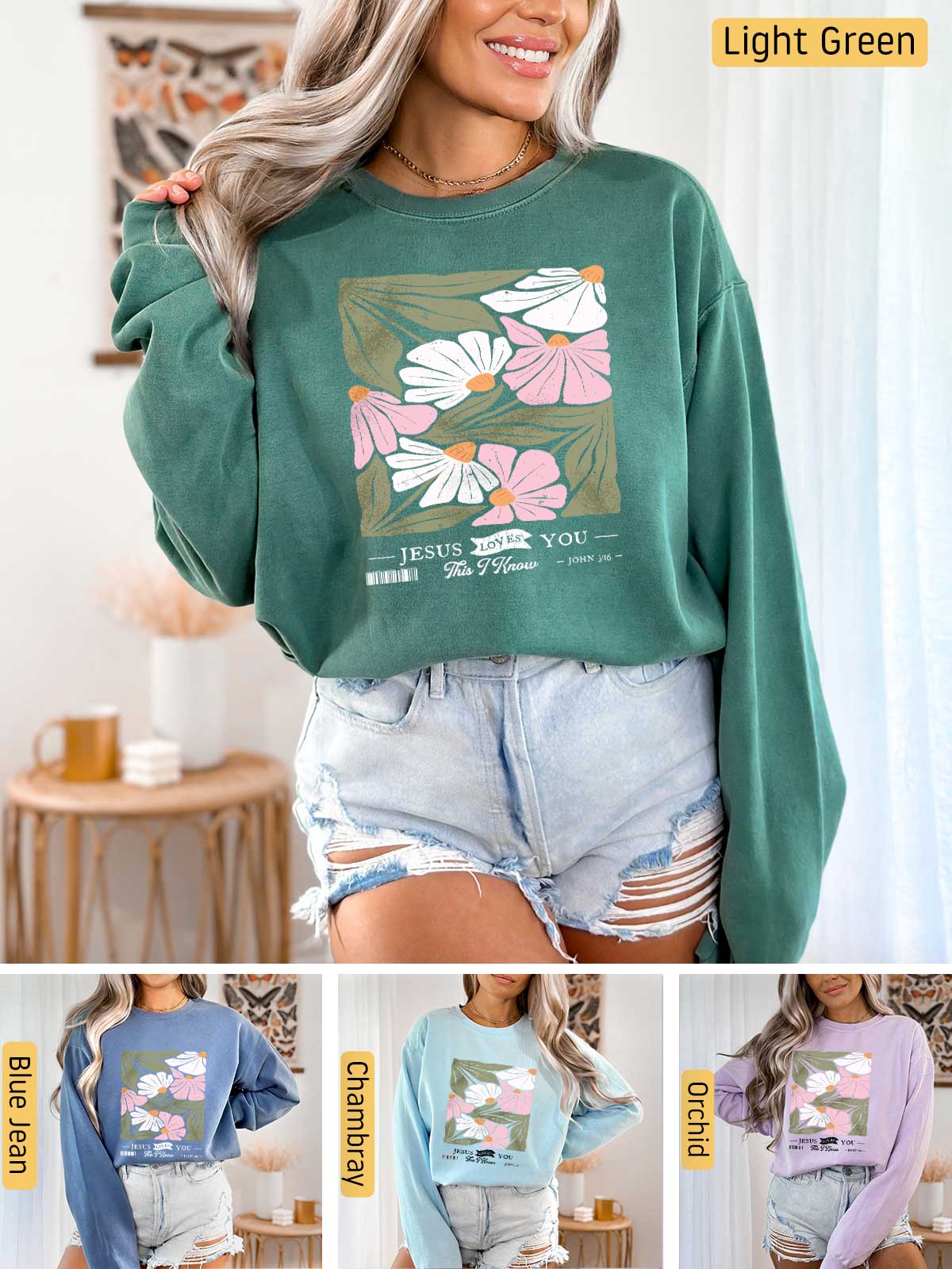 a woman wearing a green sweatshirt with flowers on it