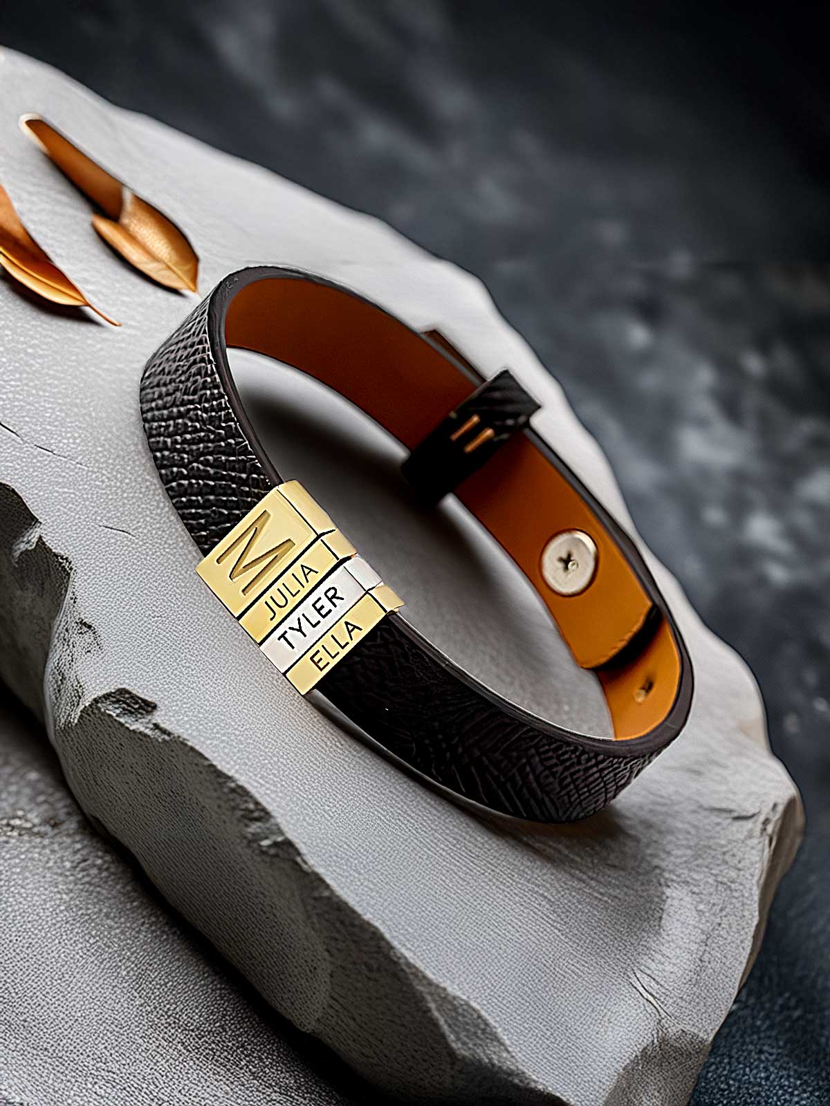 a leather bracelet with a name tag on it