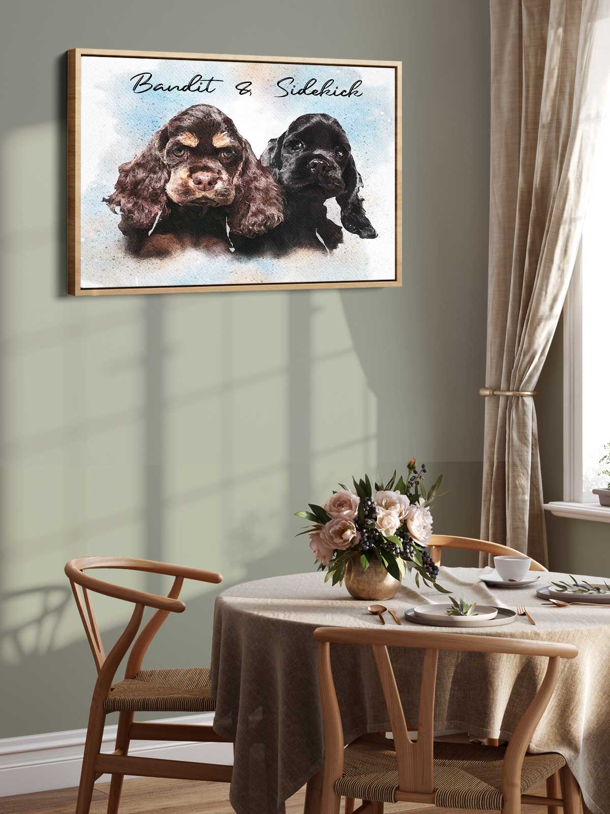 a framed painting of two dogs, likely a Cocker Spaniel, on a wall above a wooden dining table with chairs.