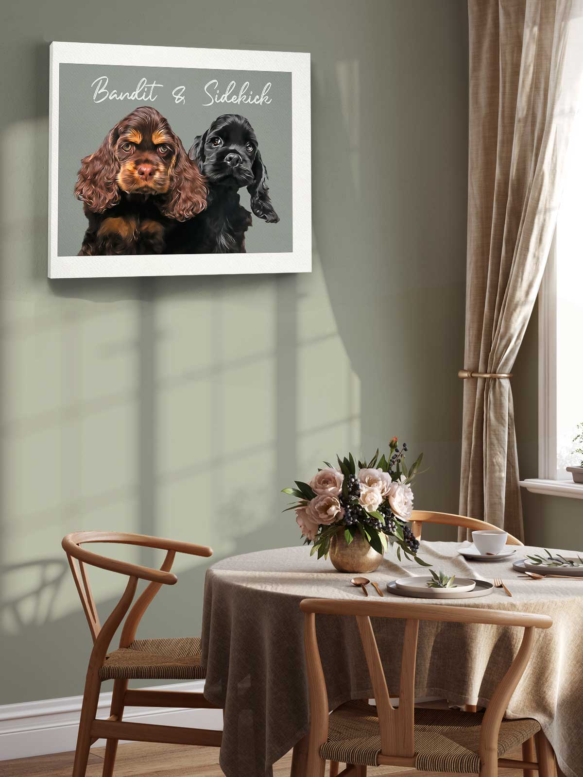 a framed photograph of two dogs, one black and one brown, sitting next to each other on a table with a vase of flowers.