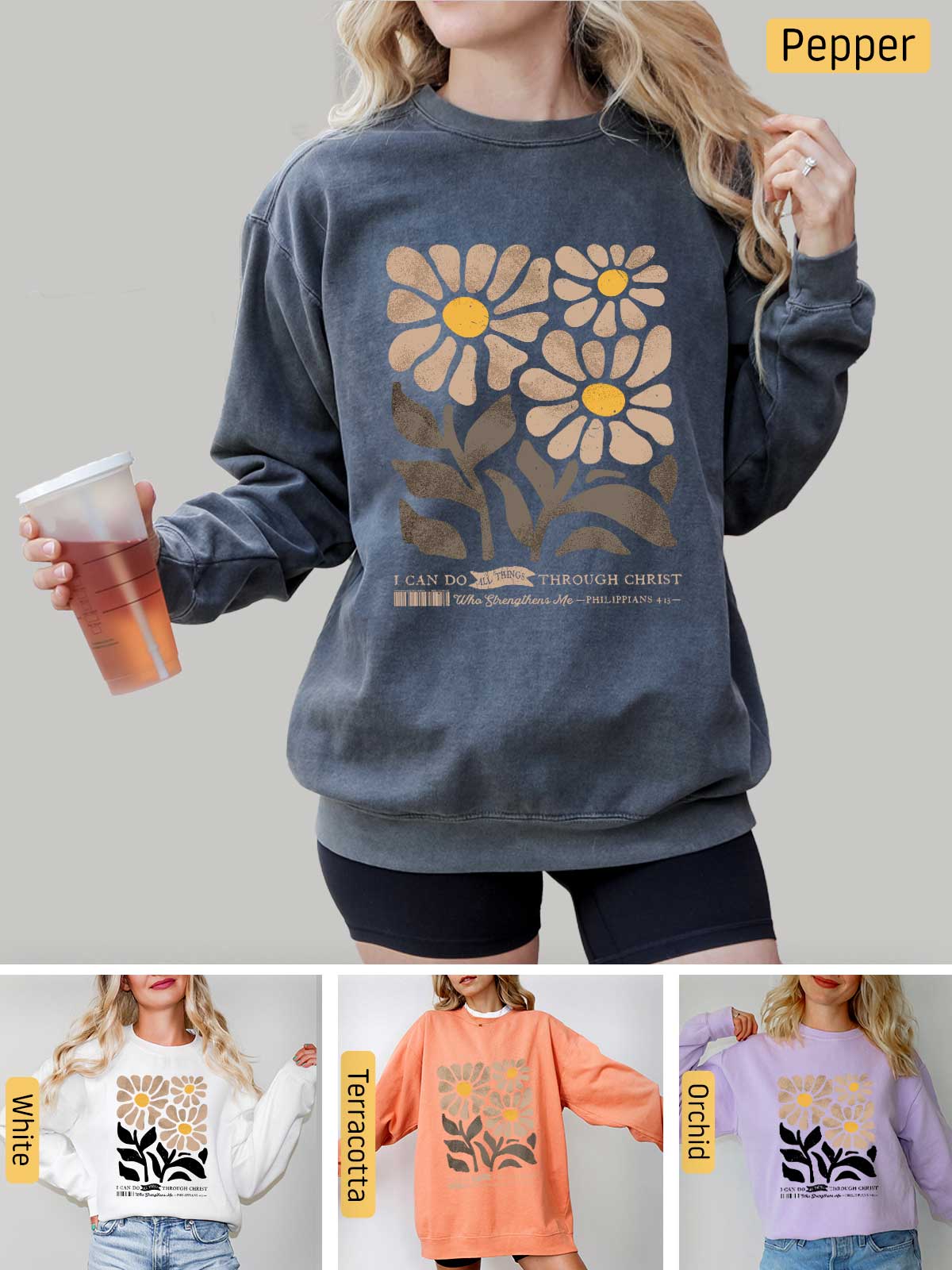 a woman wearing a sweatshirt with flowers on it