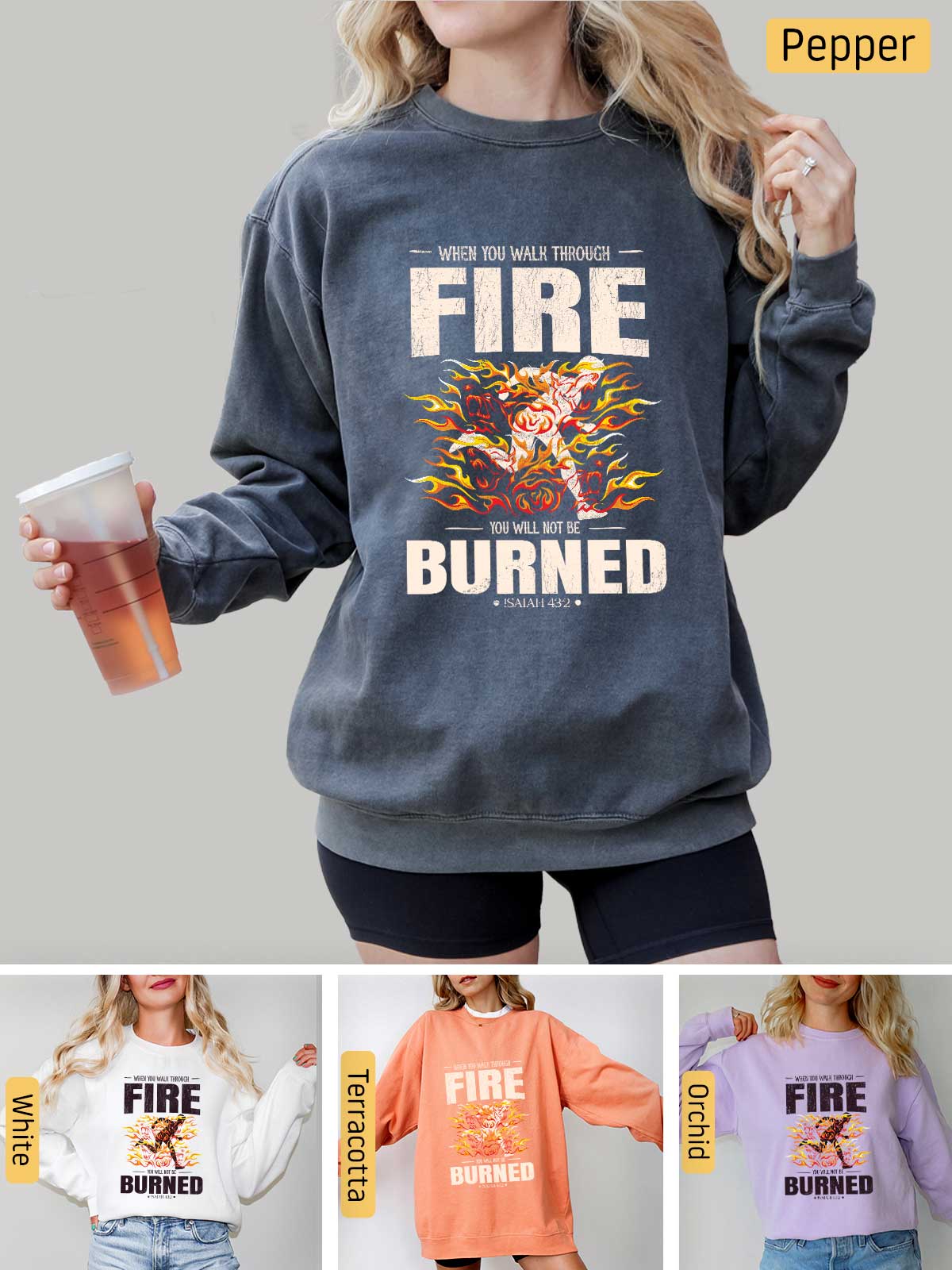 a woman wearing a fire burned sweatshirt and shorts