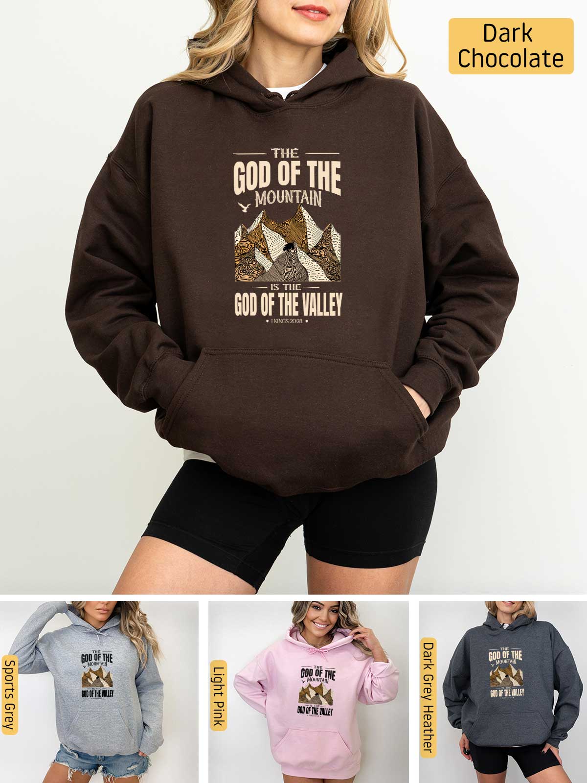 a woman wearing a hoodie with the words god of the mountain on it