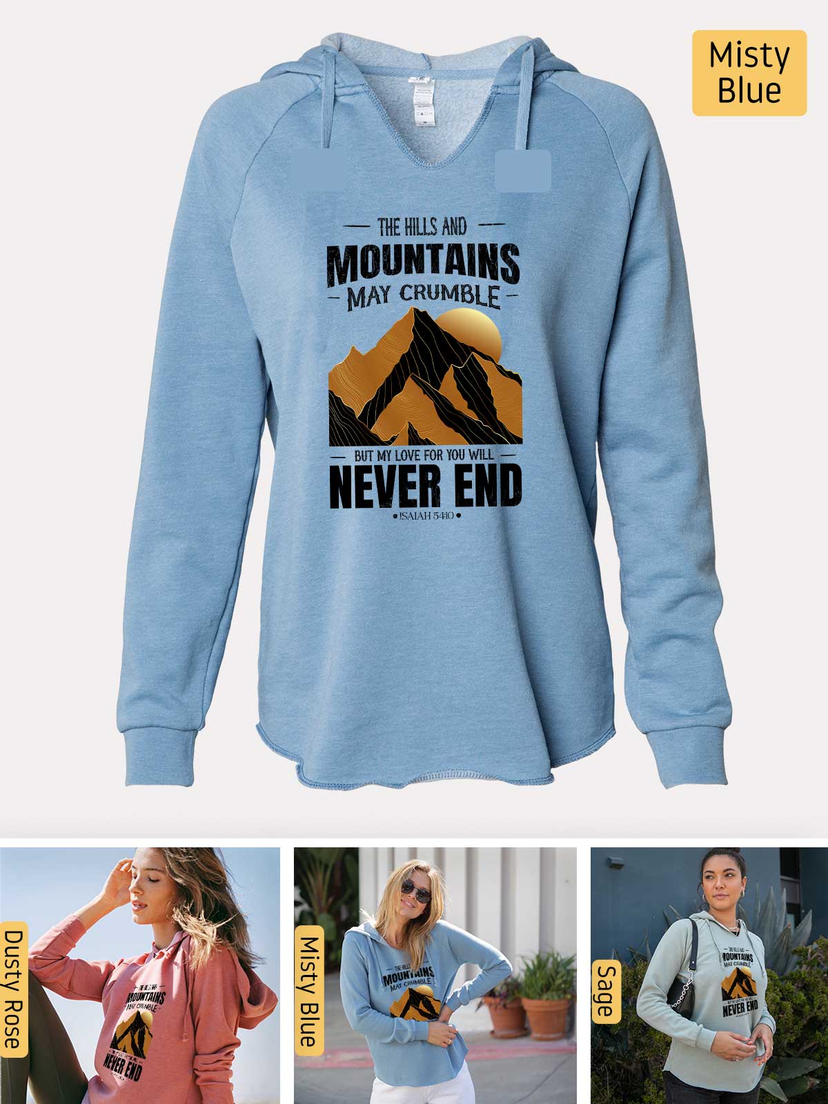 a woman wearing a blue sweatshirt with mountains on it