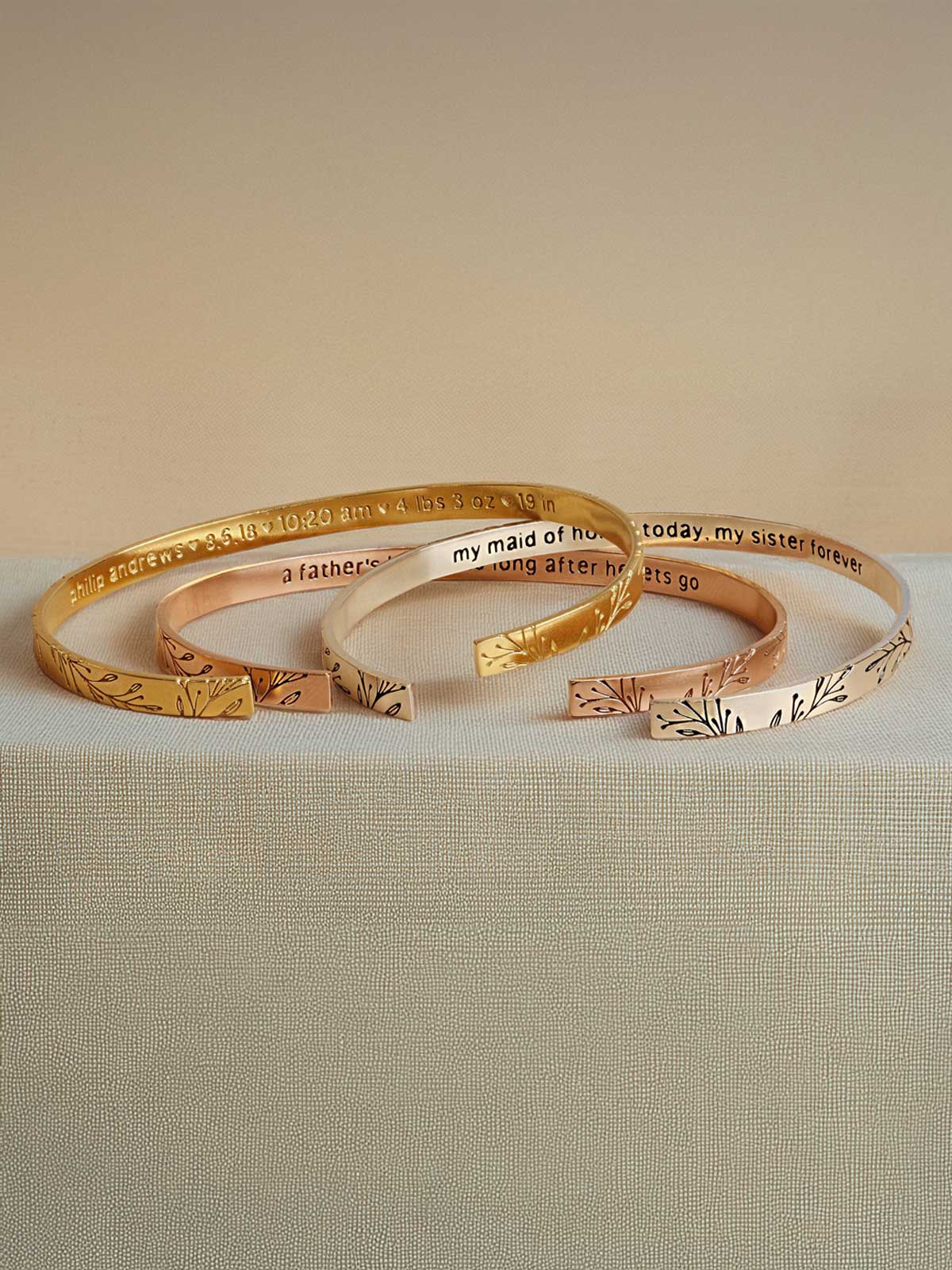 three different types of bracelets on a table