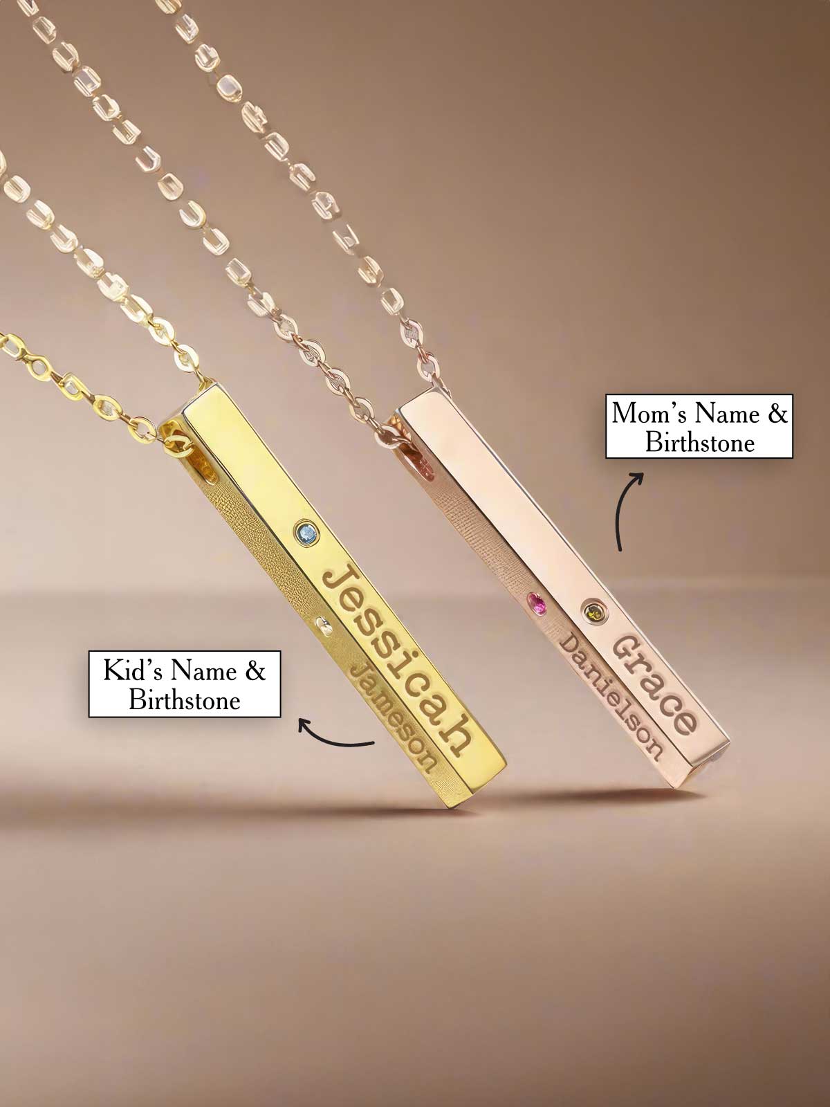 a gold bar necklace with a name tag attached to it