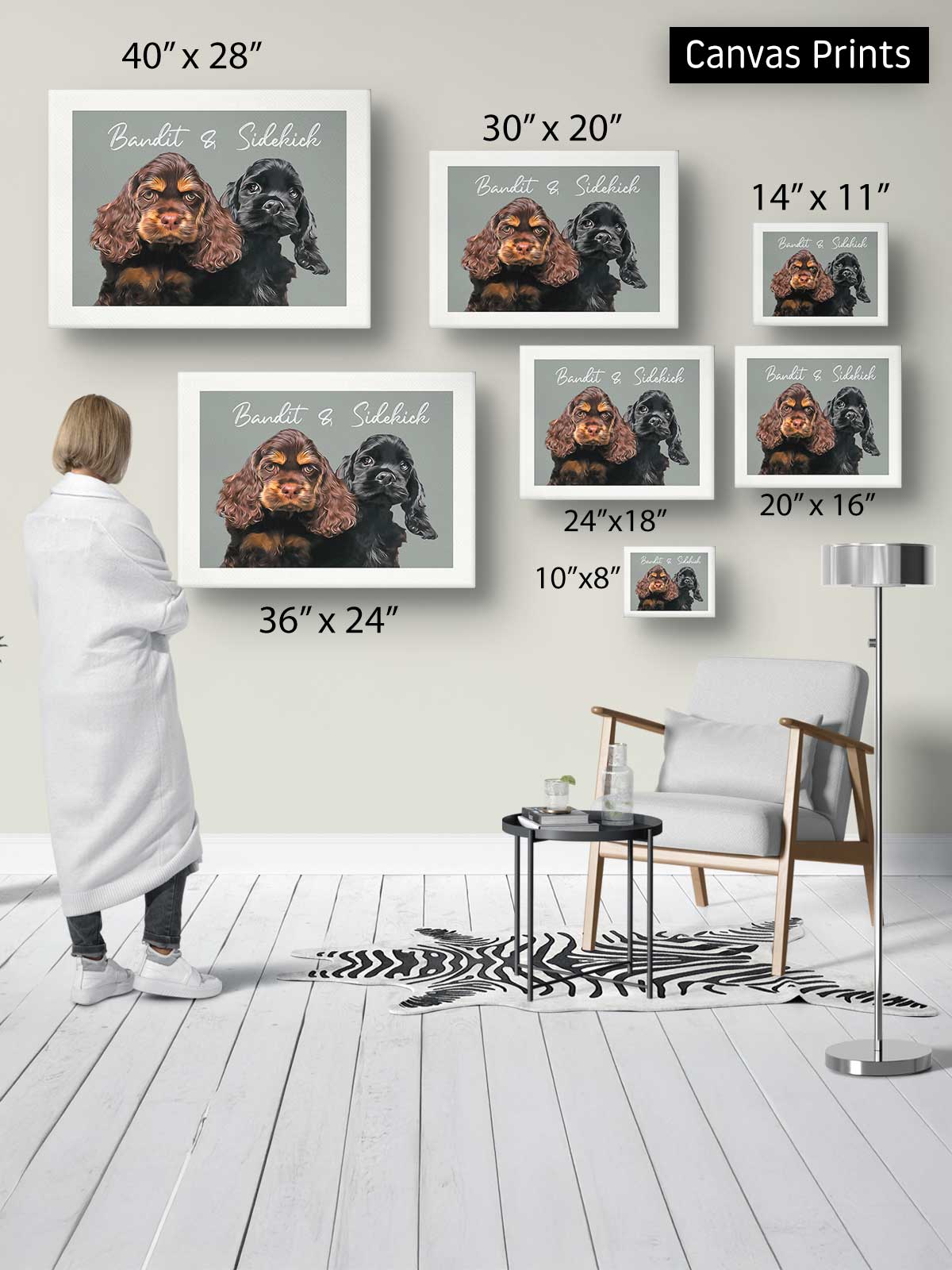 a person standing in a room, surrounded by various framed images of dogs. The person appears to be examining the different sizes of the framed images, which are displayed on the wall.