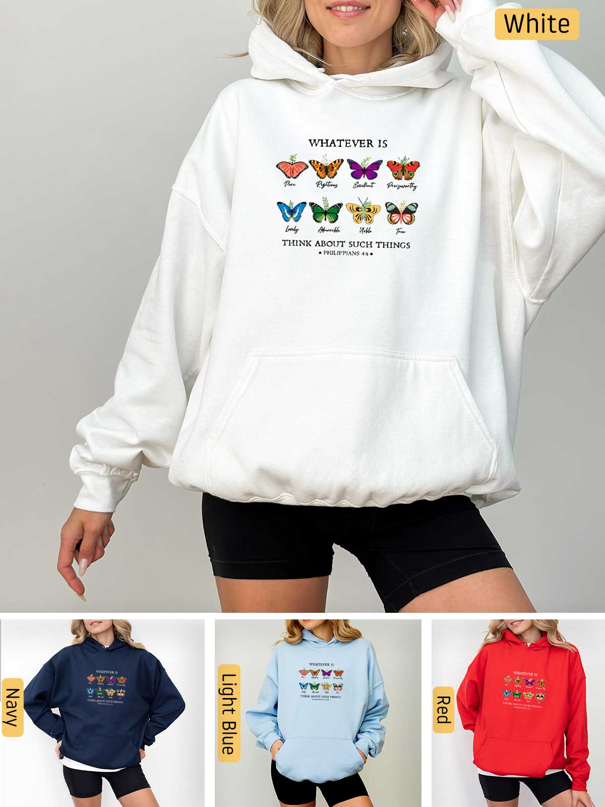 a woman wearing a white sweatshirt with butterflies on it