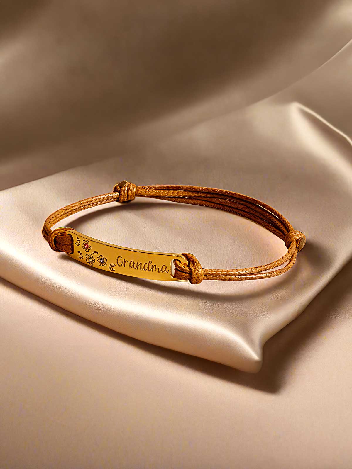 a leather bracelet with a name tag on it