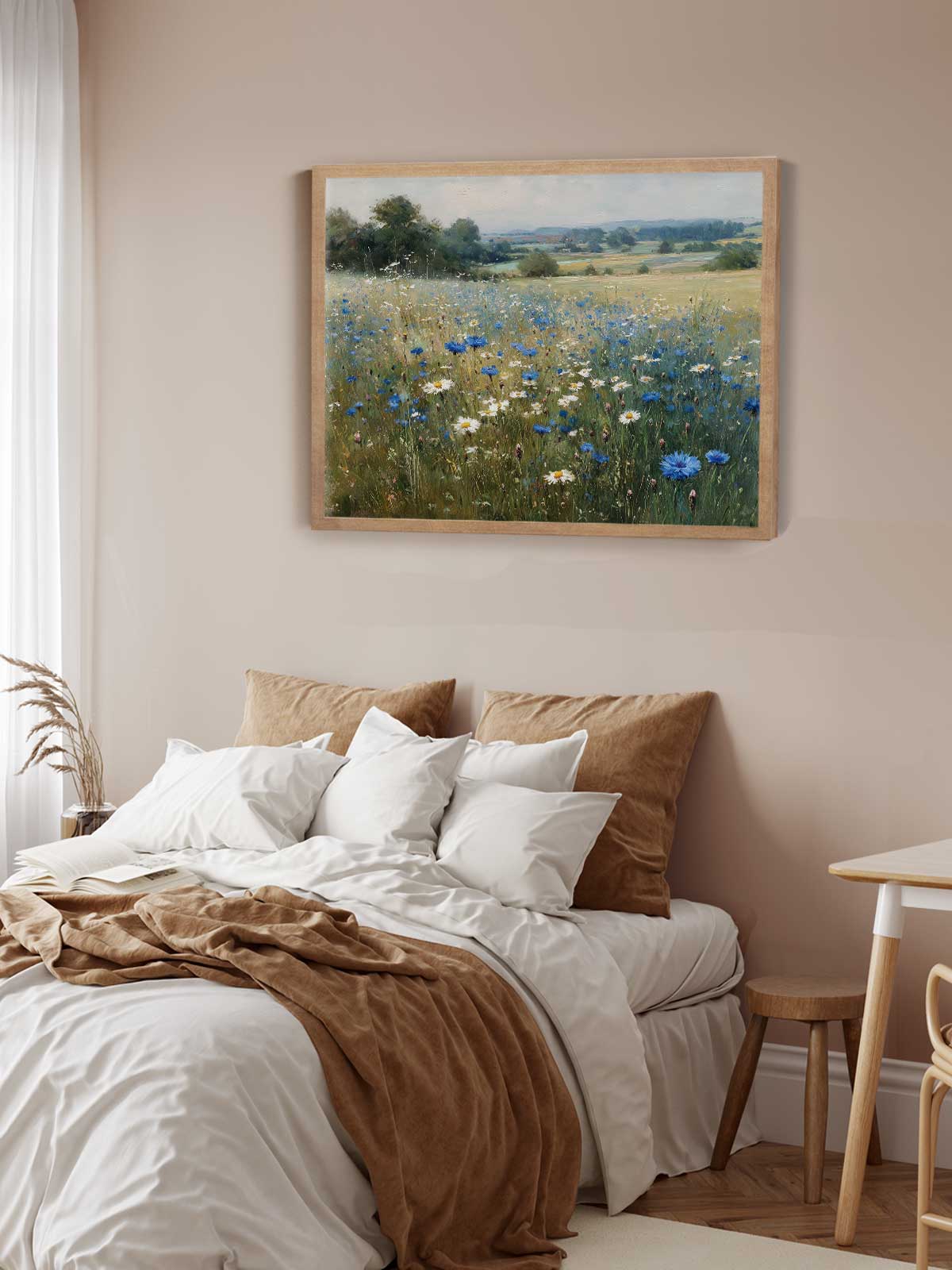a serene bedroom scene with a bed adorned with white and brown bedding, a framed painting of a field of blue and white flowers hanging on the wall above the bed, and a wooden nightstand next to the bed.
