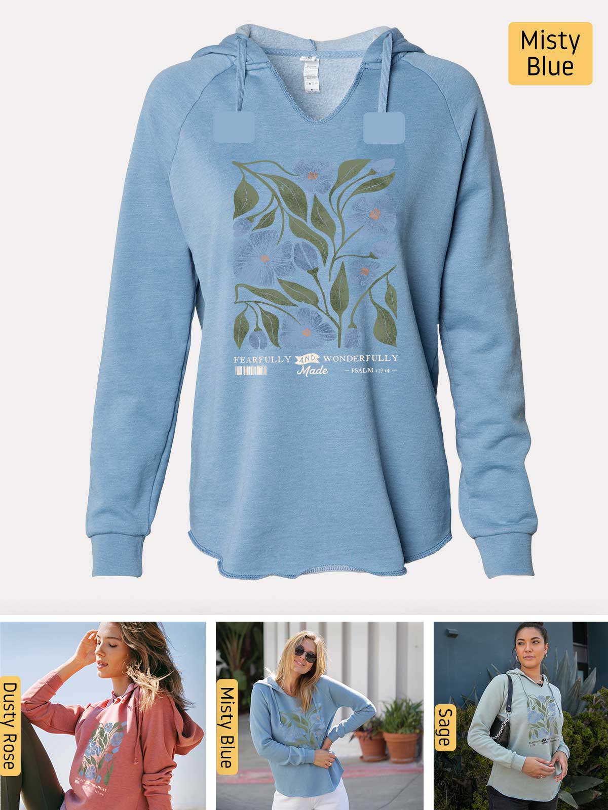 a woman wearing a blue sweatshirt with a flower on it