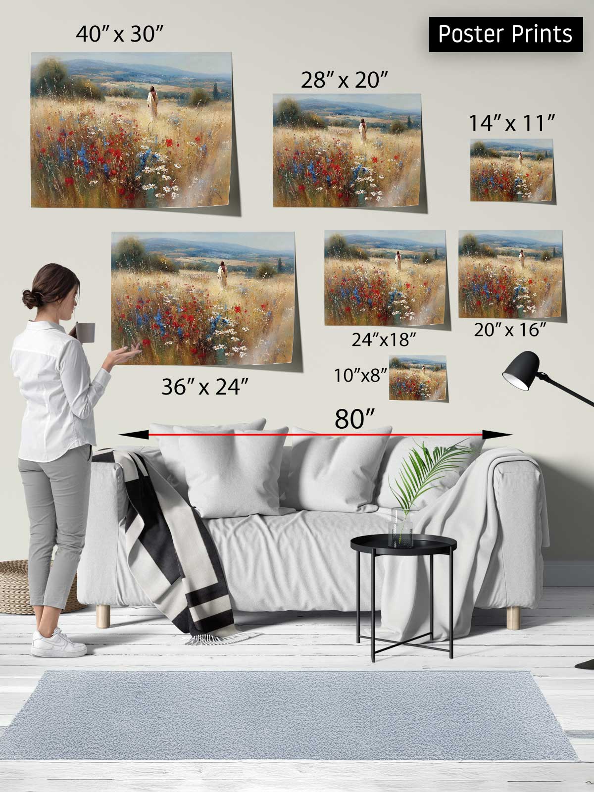 The image is a poster print display featuring a woman standing in front of a couch, with various sizes of paintings of a field of flowers and a person in the background.