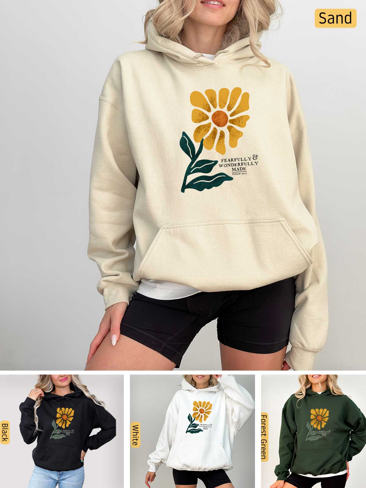 a woman wearing a sweatshirt with a flower on it