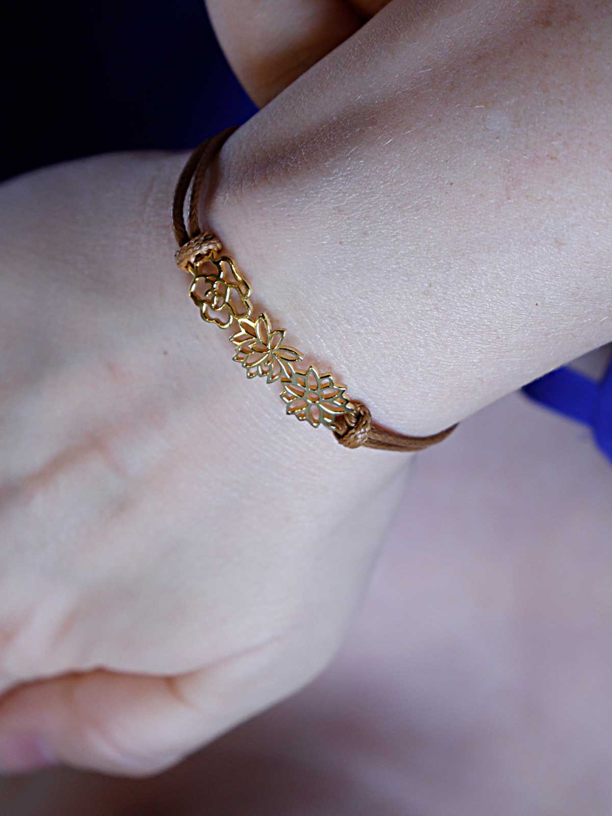 a close up of a person wearing a bracelet