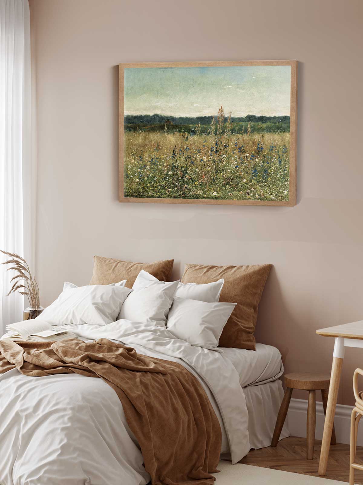 a serene bedroom scene with a bed adorned with white and brown bedding, a wooden nightstand, and a framed landscape painting hanging on the wall above the bed.