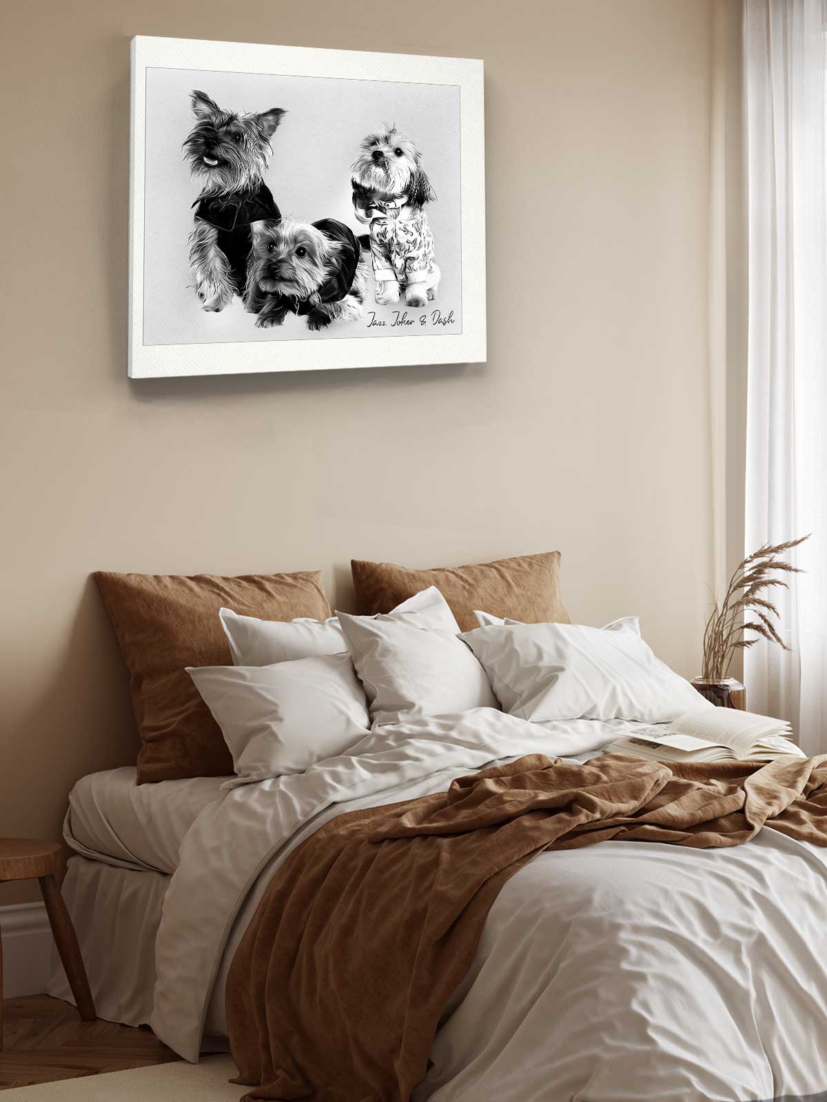 a cozy bedroom scene with a bed, pillows, and a framed black and white photograph of three dogs on the wall above the bed.