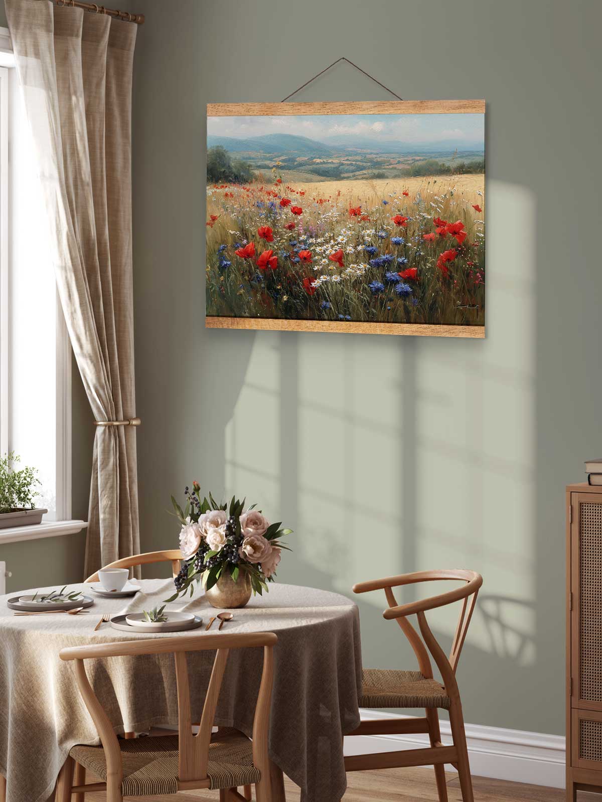 a serene dining room with a table set for two, featuring a vase of flowers and a painting of a field of red poppies hanging on the wall above the table.