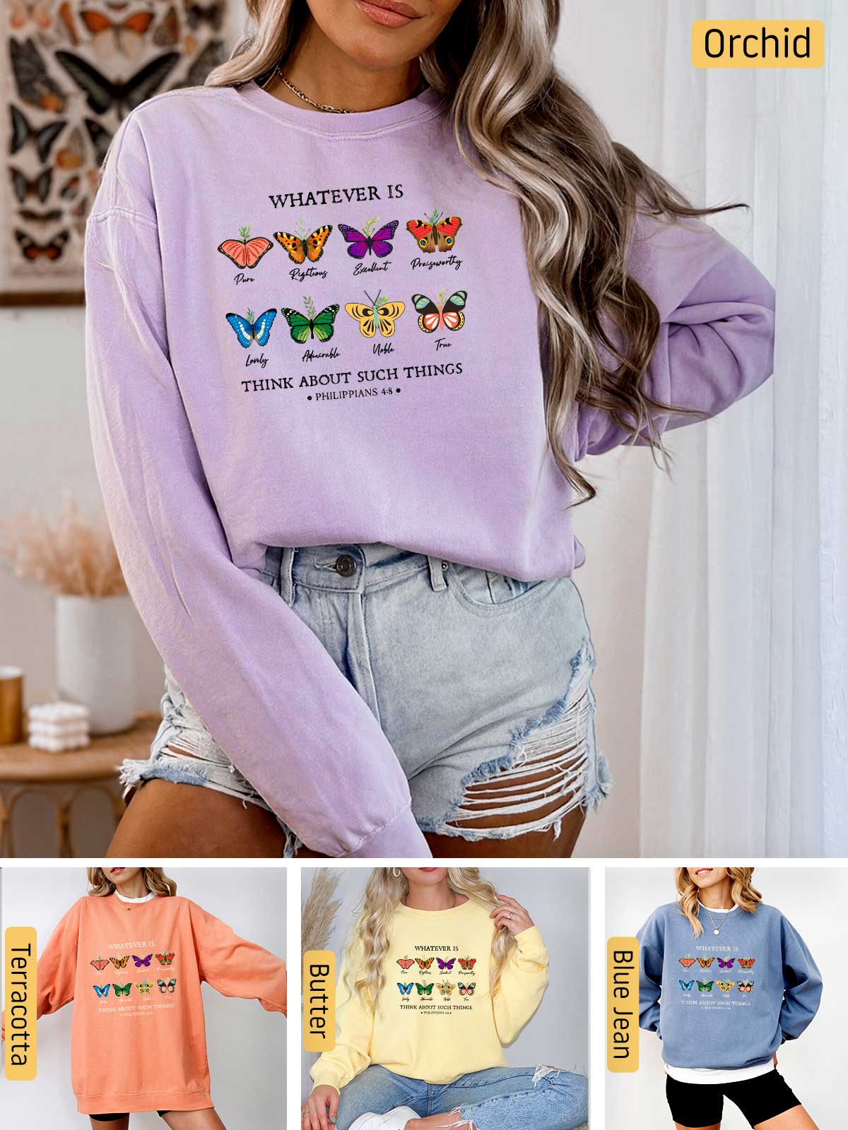 a woman wearing a sweater with butterflies on it