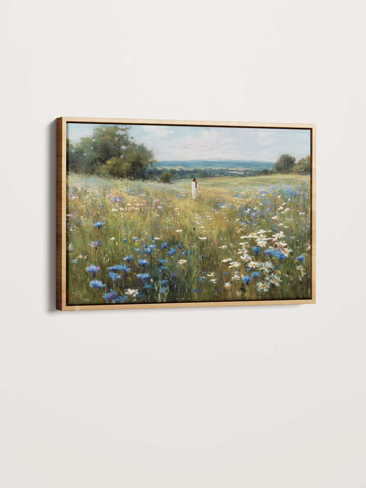 The image is a framed painting depicting a serene landscape with a field of flowers and a person walking through it.
