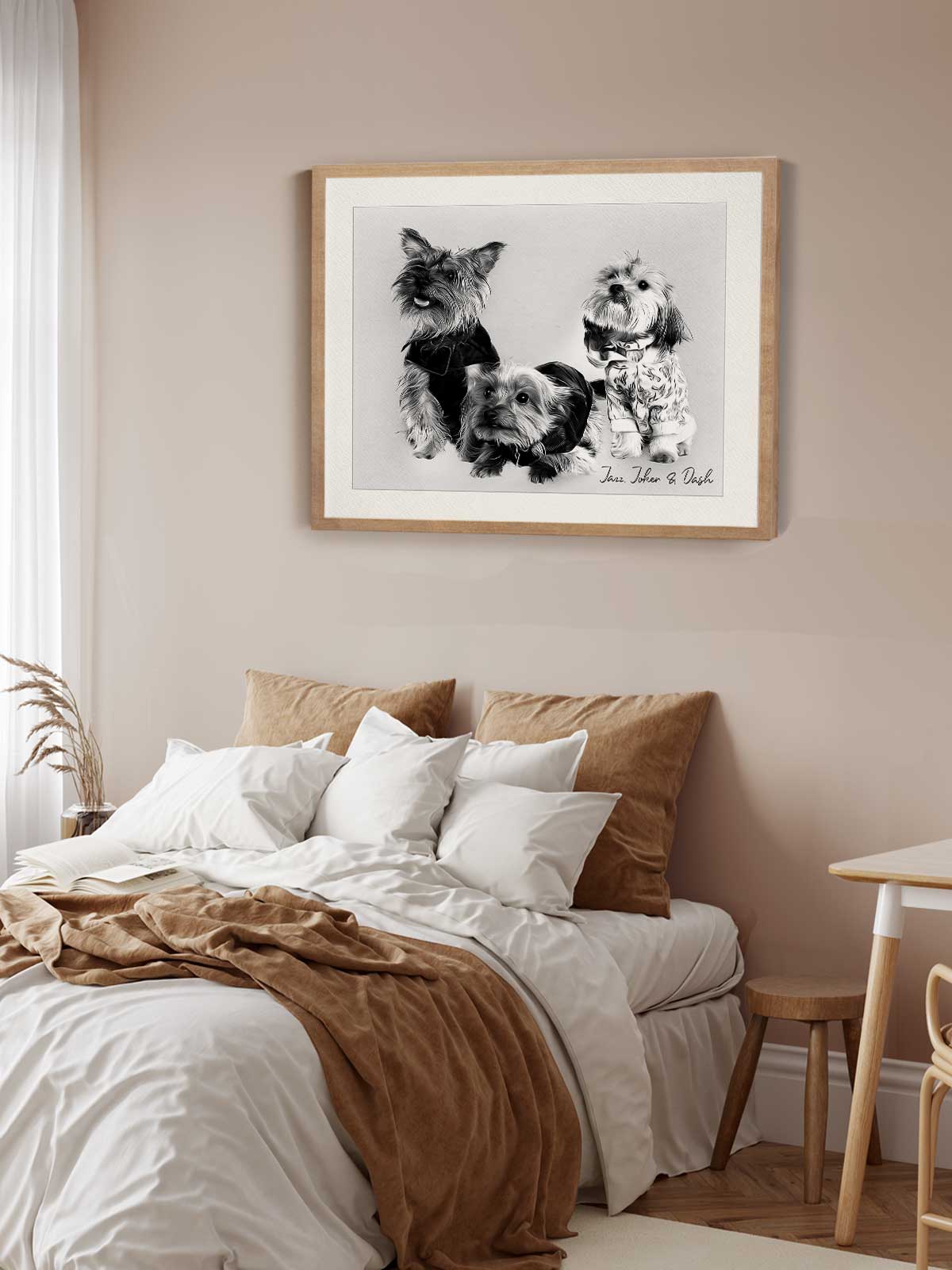 a cozy bedroom scene with a bed, a framed black and white photograph of three dogs, and a wooden nightstand.